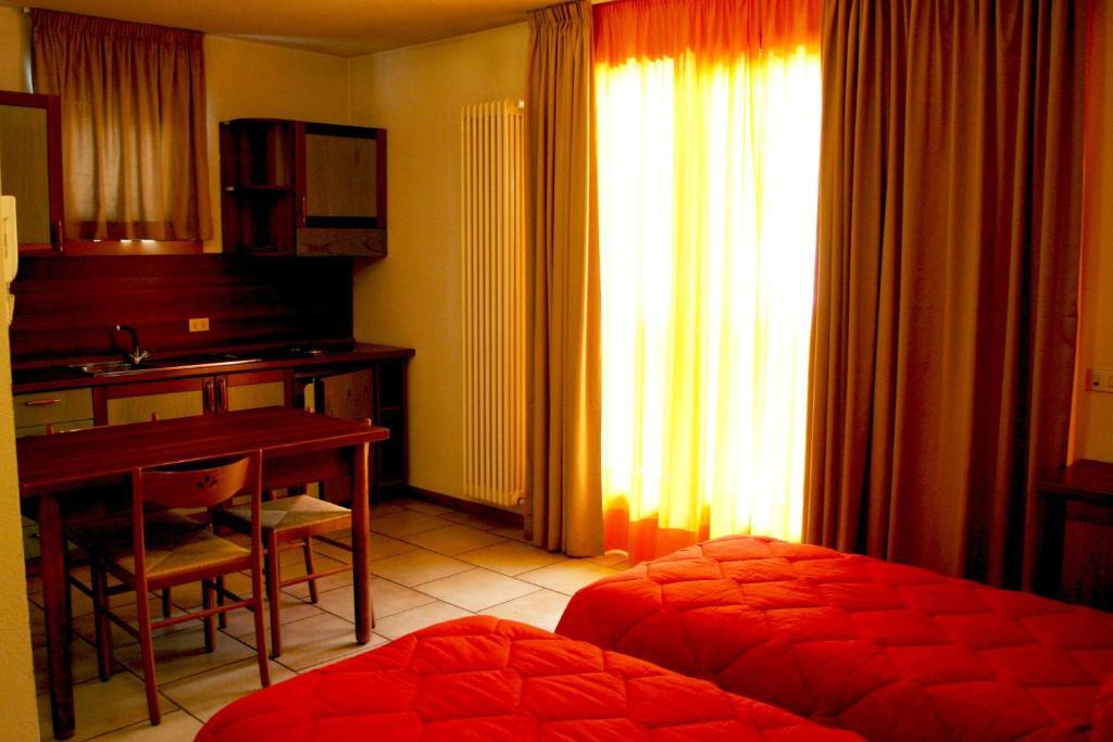 Residence Elga Valdisotto Pokoj fotografie